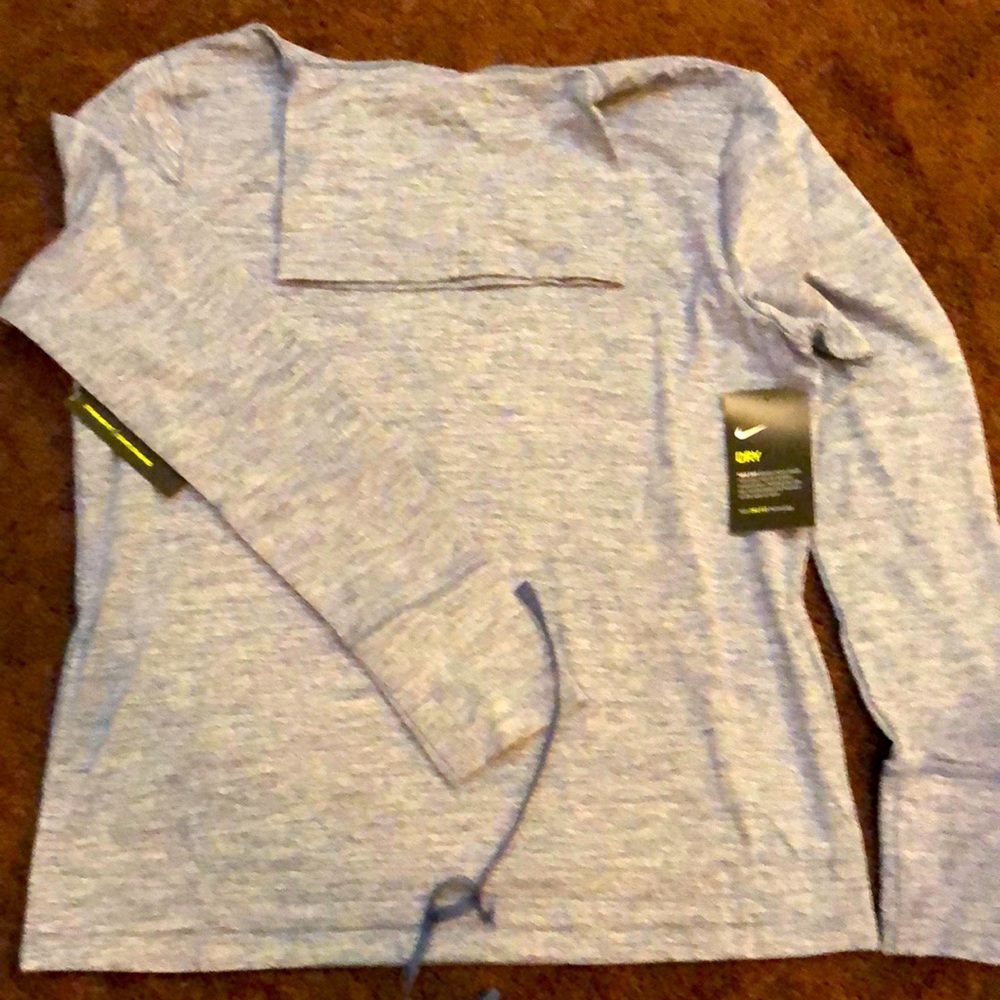 New Nike turtle neck,bottom drawstring w/ dry fit tech. Blue and white pattern.